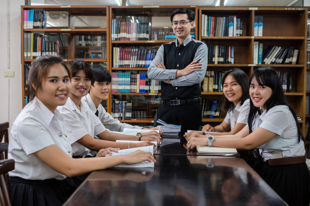 Portrait of Asian teacher in the classroom, University education concept - Photo, Image