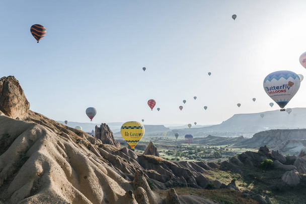 CAPPADOCIA, TURKEY - 09 MAY, 2018: colorful hot air balloons flying above goreme national park, cappadocia, turkey - Fotó, kép