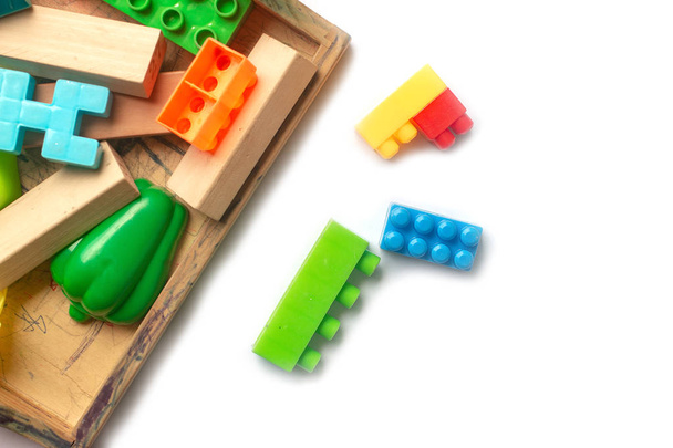 Toy colorful plastic blocks isolated on white background - Photo, Image