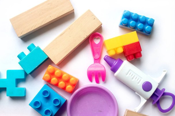 Toy colorful plastic blocks isolated on white background - Photo, Image
