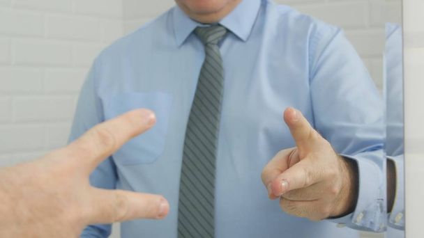 Man Stay in Front of Bathroom Mirror Playing Scissors Hand Gestures Game - Foto, imagen