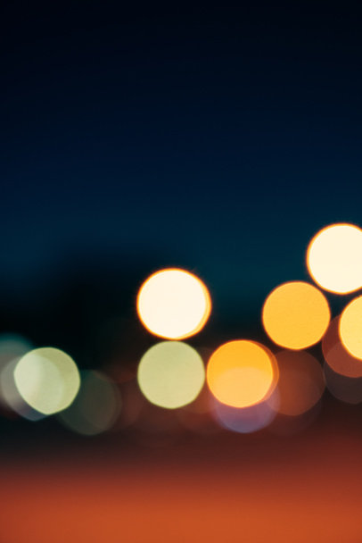 close up view of colorful bokeh lights on dark background - Photo, Image