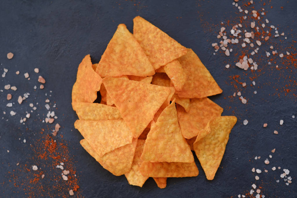 junk fast food eating crispy nacho tortilla chips - Foto, immagini
