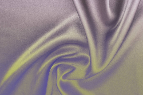 布の背景のテクスチャです。灰色青い絹の布。銘刻文字のためのテクスチャです。豪華なファブリックや液体波の抽象的な背景やサテン素材で作られたシルクのグランジ テクスチャの波状のひだの一部 - 写真・画像
