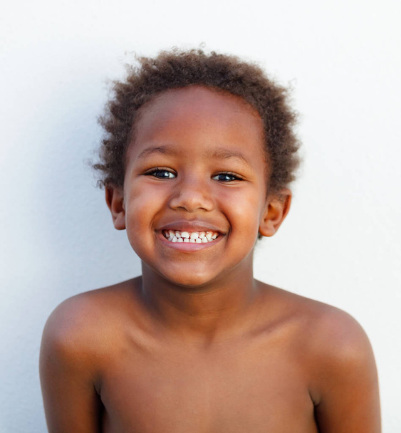 funny and happy African little boy isolated on white background - Valokuva, kuva