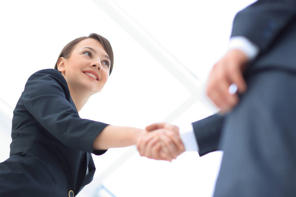 background image of business partners handshaking.close-up. - Photo, Image