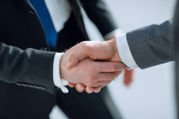 close up.reliable handshake of business partners - 写真・画像