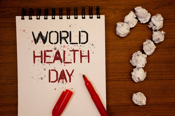 Conceptual hand writing showing World Health Day. Business photo showcasing Special Date for Healthy Activities Care Prevention Ideas on notebook wooden background quotation mark - Photo, Image