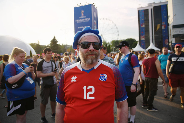 June 25, 2018. Rostov-on-Don. Russia. Fans of the Iceland national football team with the flags of the country and with a decorated face at the fan festival. FIFA World Cup. - Zdjęcie, obraz