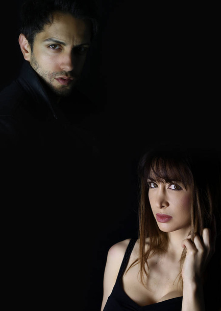 Book cover design . dramatic fashion man and woman on black background - Foto, Imagem