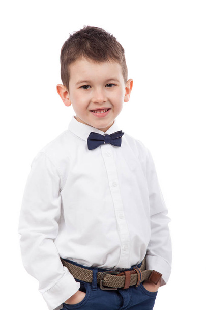 Cute little boy with white shirt and bow tie, isolated on white. Elegant little gentleman - Fotografie, Obrázek
