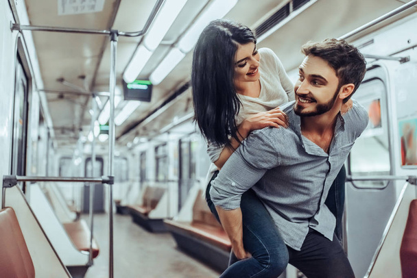 Young romantic couple in subway. Underground love story. - Foto, Imagem