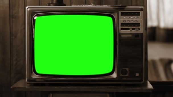 Vintage Tv schermo verde. Estetica degli anni '80. Seppia Tone. Zoom Out. Pronto a sostituire lo schermo verde con qualsiasi filmato o immagine che desideri. Full HD
. - Filmati, video