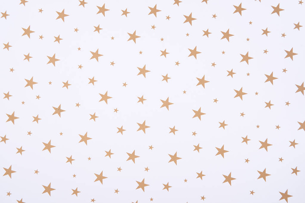 Abstrakti kuvio kirkkailla tähdillä valkoisella taustalla
 - Valokuva, kuva