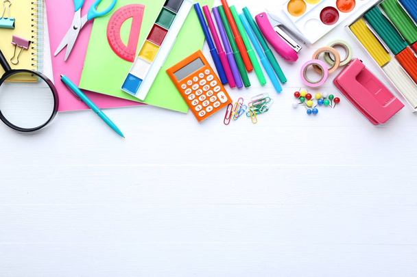 School supplies on white wooden table - Photo, image