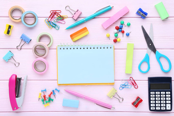 School supplies with blank sheet of paper on wooden table - Foto, Imagem