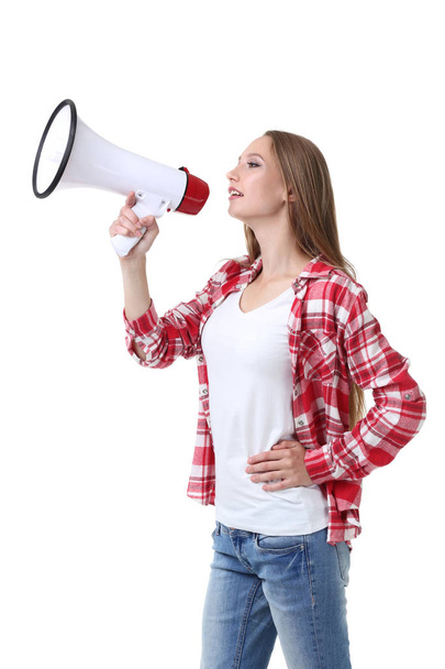 Young woman screaming in megaphone on white background - Fotoğraf, Görsel