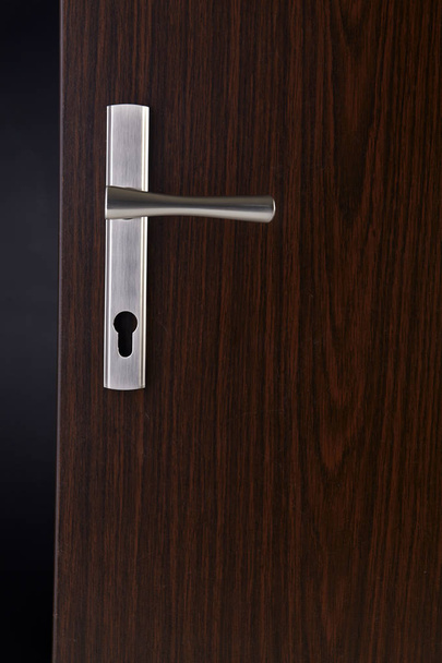 Modern, contemporary steal handle and keyhole detail - Φωτογραφία, εικόνα