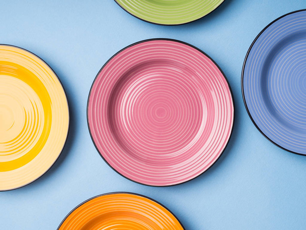 Colorful ceramic dishes. Flat lay - Foto, Imagen