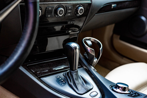 car interior. Modern car speedometer and dashboard. Luxurious car instrument cluster. - Фото, изображение