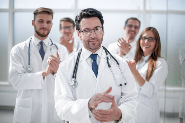 successful doctor, accepting congratulations from colleagues - Photo, Image