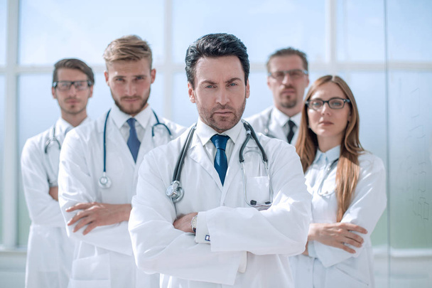 portrait of doctor and medical staff standing in the office - Foto, Bild