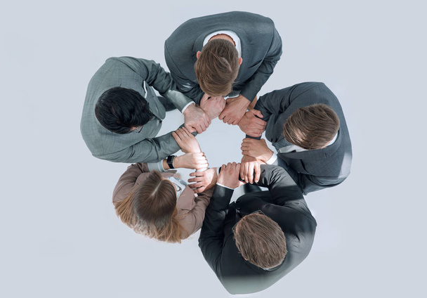 top view .business team standing in a circle - Foto, Bild