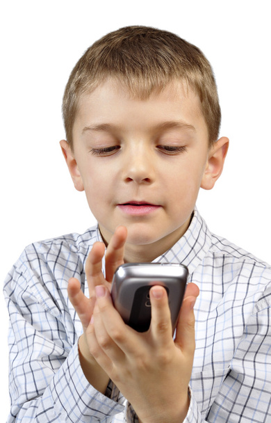 Young boy using mobile phone - Foto, afbeelding