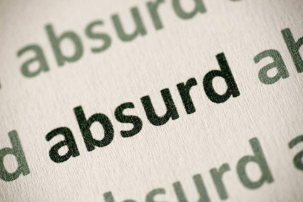 word absurd printed on white paper macro - Photo, Image