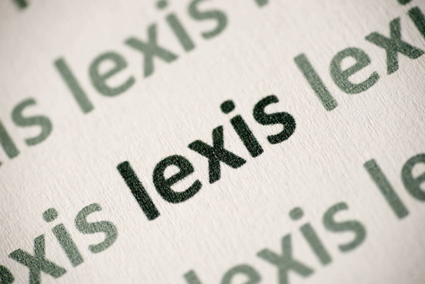 word lexis printed on white paper macro - Photo, Image