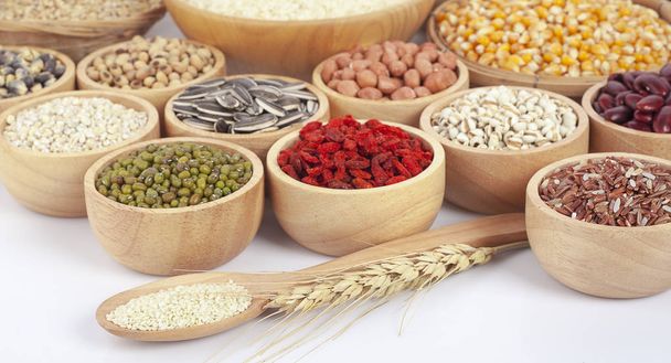 Cereal grains , seeds, beans on wooden background - Valokuva, kuva