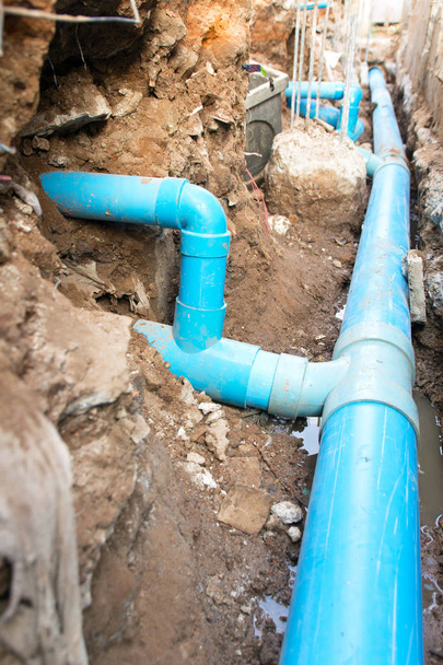 Repair the broken pipe in underground  - Photo, Image