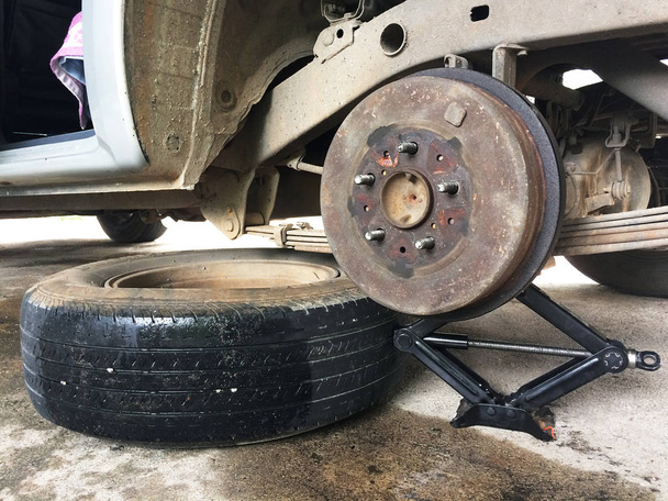Emergency Changing Truck Spare Wheel on the Roadside, DIY Maintenance with Simple Tools Equipment. - Photo, Image
