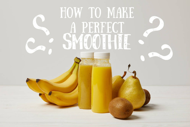 yellow detox smoothies in bottles with bananas, pears and kiwis on white background, how to make perfect smoothie inscription - Foto, Imagem