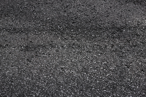 Terrain d'asphalte frais. Route de construction
. - Photo, image
