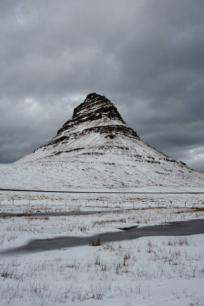 Kirkjufell, Iceland in the middle of winter with a lot of snow - Foto, Imagem