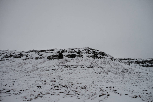 A snow covered hill in Snaefellsnes, Iceland in the middle of winter. - Photo, Image