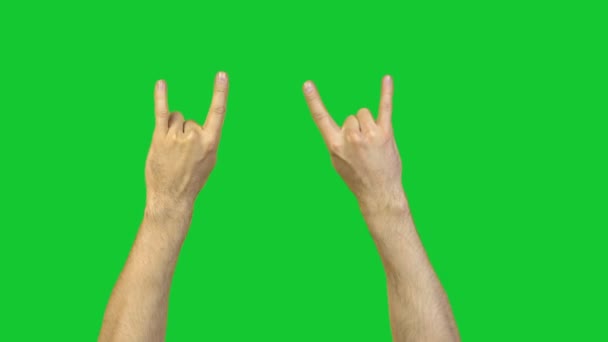 緑の背景に男性ヤギ ジェスチャー - 映像、動画