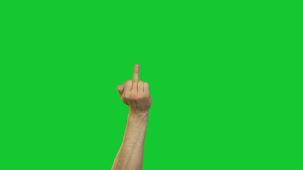 Male middle fingers on green background - Footage, Video