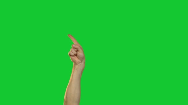 Pointing forefinger on green background - Footage, Video