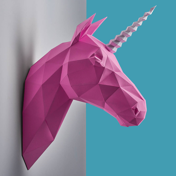 Pink saturated geometrical unicorns head. - Fotoğraf, Görsel