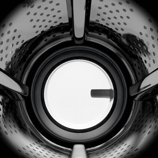 A closeup from the inside of the drum of an industrial washing machine looking outwards towards the shut door - 3D render - Foto, imagen