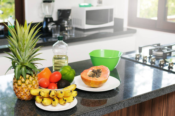 Fresh fruits and vegetables for vegetarian meal or smoothie in the kitchen - Valokuva, kuva