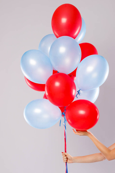 Many colorful balloons isolated on gray background - Φωτογραφία, εικόνα