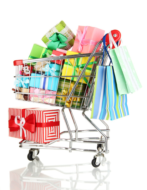 Christmas gifts and shopping in trolley isolated on white - Fotoğraf, Görsel