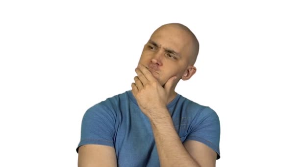Thoughtful bald man on white background - Footage, Video