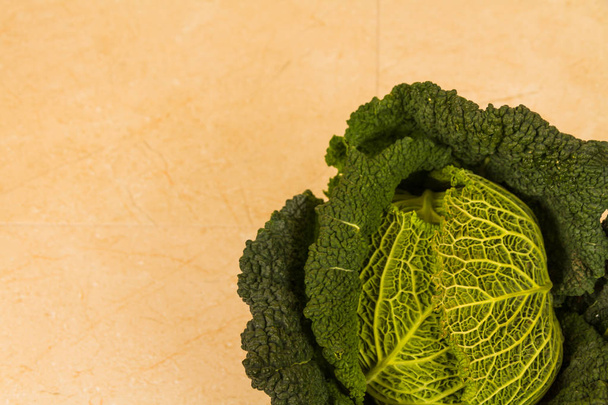 Savoy cabbage viewed from above, pale background - Photo, Image