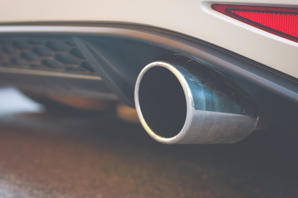 Close up of car exhaust pipe.Toned. - Photo, Image