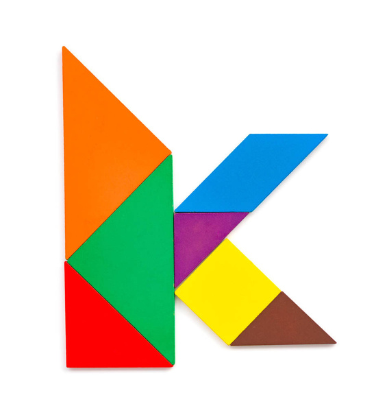 tangram shaped like a letter K on white background - Photo, Image