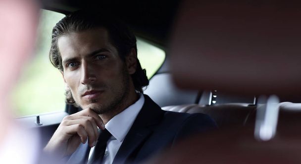 businessman sitting in his car. - Foto, Imagen